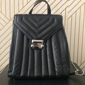 Micheal Kors purse backpack